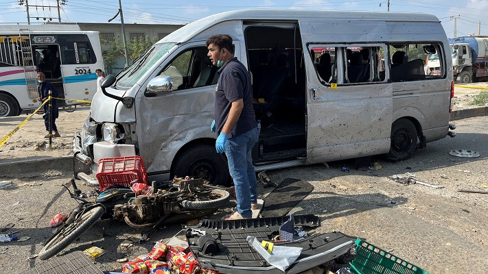 view of a damaged car after a suicide blast in karachi photo reuters