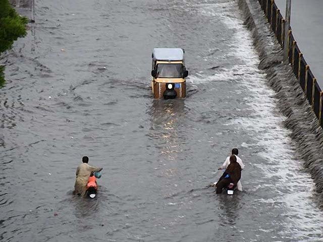 a view of a flooded road after heavy monsoon rains in karachi photo afp file