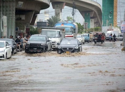 two missing after three swept away by flash flood in karachi