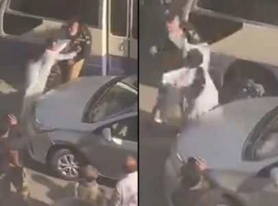 watch karachi woman slaps traffic police officer for stopping her car watch karachi woman slaps traffic police officer for stopping her car