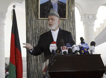 karzai confirms holding talks with taliban