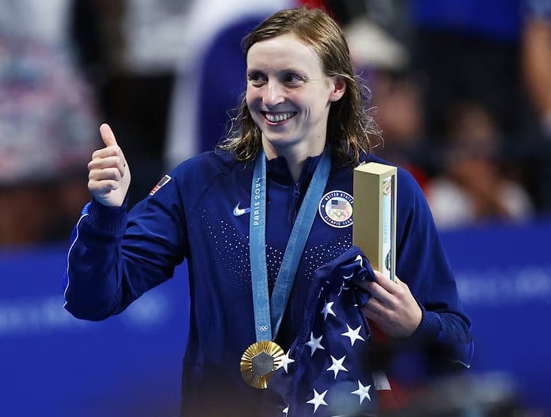 gold medallist katie ledecky of united states celebrates after winning the race and setting a new olympic record photo reuters