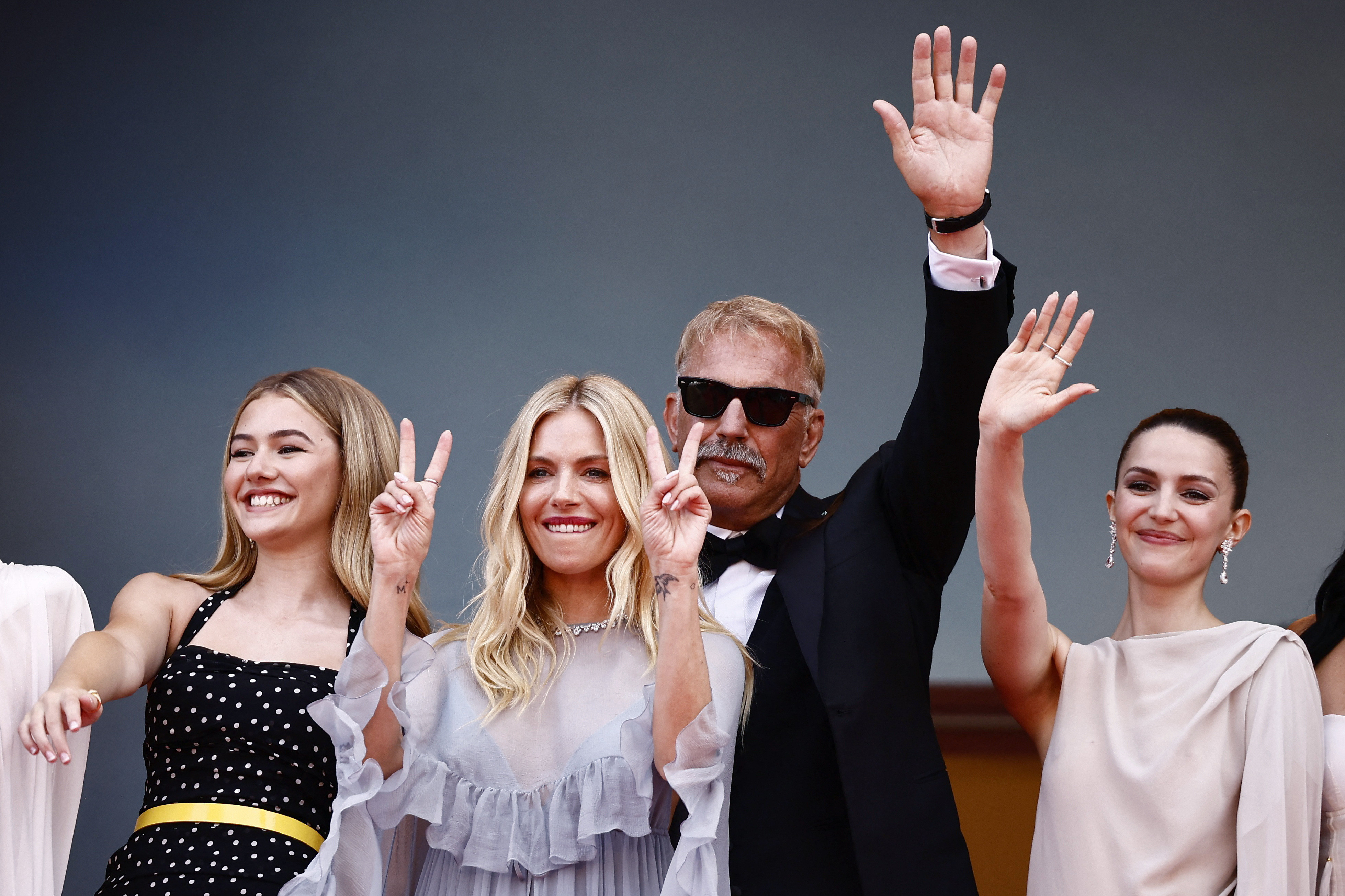 Kevin Costner with cast members Georgia MacPhail, Ella Hunt, and Sienna Miller (Courtesy: REUTERS)