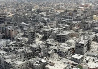 an aerial view of destroyed buildings in khan younis in the southern gaza strip on april 22 2024 photo afp