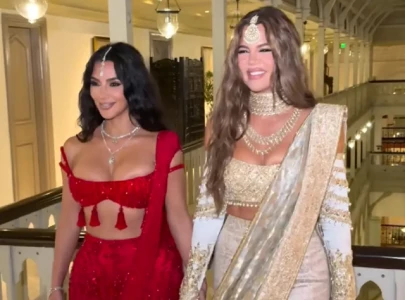 kim kardashian receives hilarious help from sister khlo with skims bodysuit snaps kim kardashian receives hilarious help from sister khlo with skims bodysuit snaps