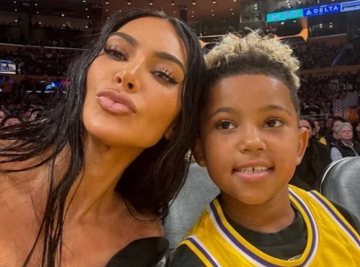 kim kardashian makes son saint sign contract before starting youtube channel
