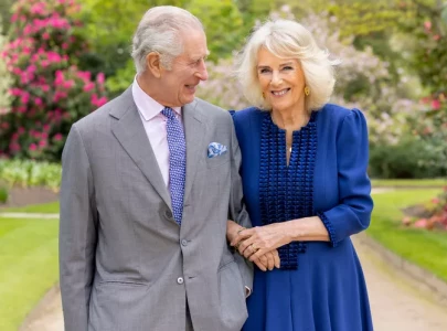 king charles and queen camilla s new portrait reveals sweet connection to grandchildren
