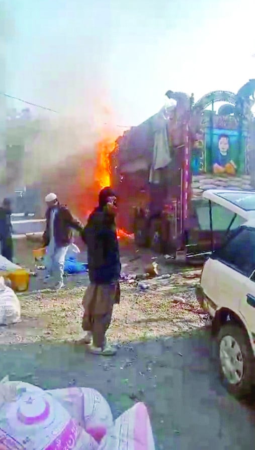 flames billow into the sky as a truck carrying relief goods to parachinar catches fire after being attacked by terrorists photo express