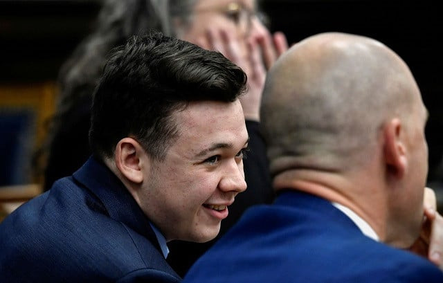kyle rittenhouse speaks with his attorneys before the jury is relieved for the evening during his trial at the kenosha county courthouse in kenosha us november 18 2021 photo reuters kyle rittenhouse speaks with his attorneys before the jury is relieved for the evening during his trial at the kenosha county courthouse in kenosha us november 18 2021 photo reuters