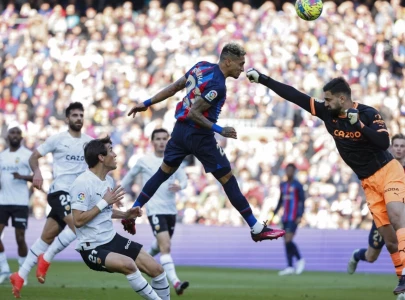 barca beat valencia to move nine points clear barca beat valencia to move nine points clear