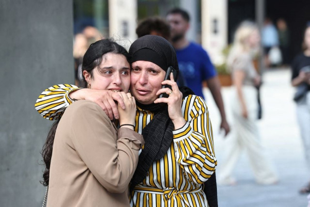 people react outside field s shopping centre after danish police said they received reports of shooting in copenhagen denmark july 3 2022 photo reuters