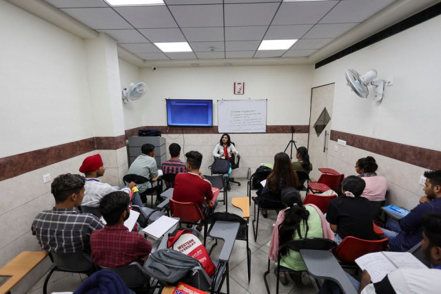 students attend an international english language testing system ielts class conducted by western overseas an institute providing coaching for english language proficiency tests and visa consultancy in ambala india august 4 2022 reuters students attend an international english language testing system ielts class conducted by western overseas an institute providing coaching for english language proficiency tests and visa consultancy in ambala india august 4 2022 reuters