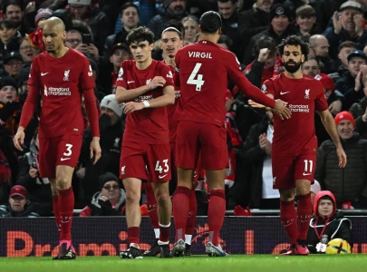 liverpool tame wolves to climb into top six