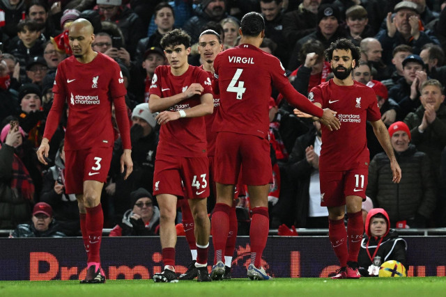 liverpool tame wolves to climb into top six