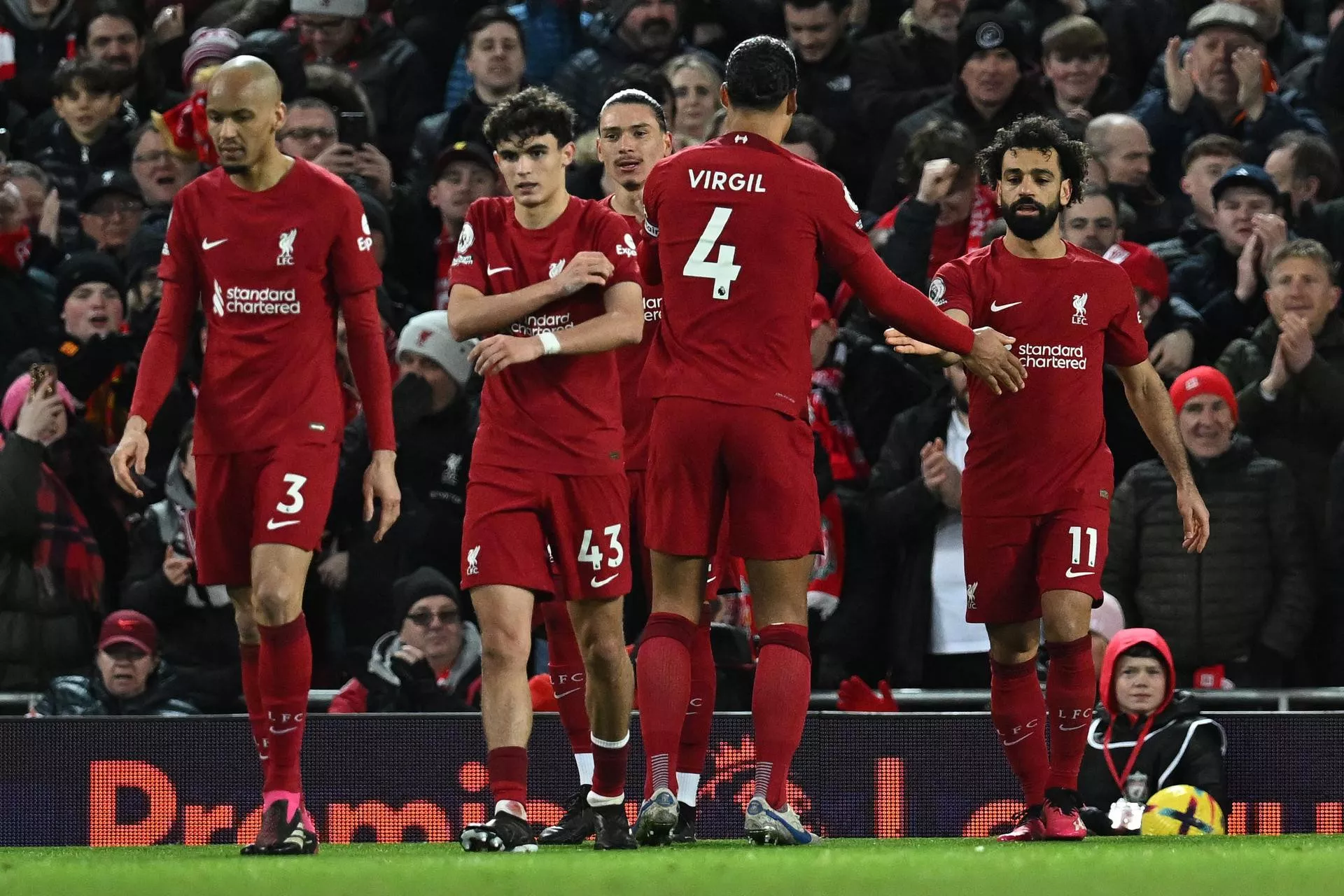 liverpool tame wolves to climb into top six