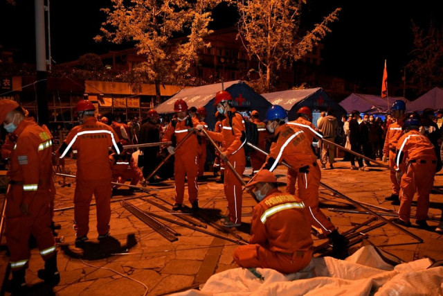 rescue workers set up tents at a shelter following a 6 8 magnitude earthquake in moxi town luding county ganzi tibetan autonomous prefecture sichuan province china september 5 2022 china daily via reuters file photo rescue workers set up tents at a shelter following a 6 8 magnitude earthquake in moxi town luding county ganzi tibetan autonomous prefecture sichuan province china september 5 2022 china daily via reuters file photo