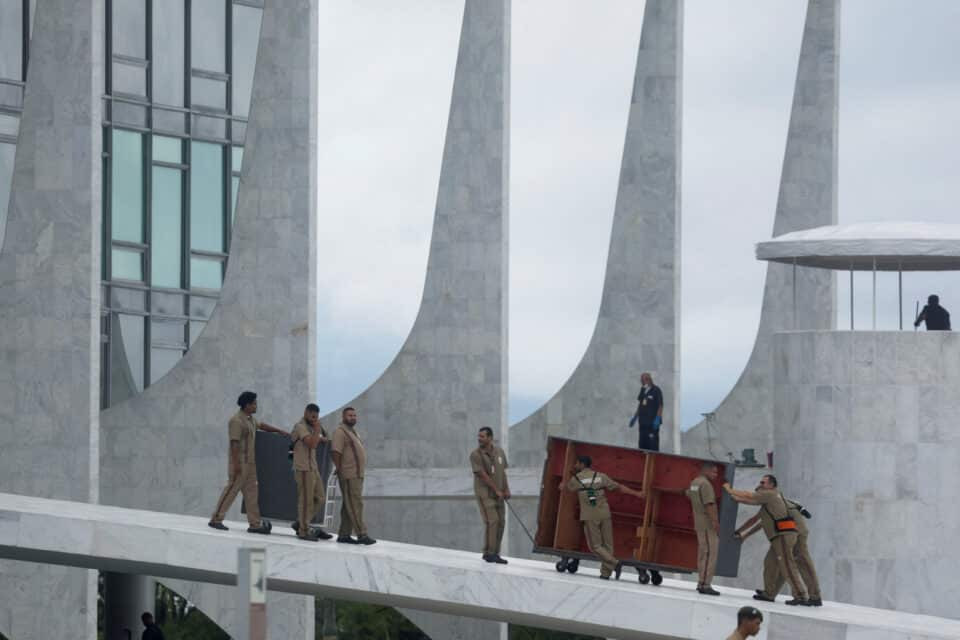 men work at planalto palace ahead the inauguration ceremony of president elect luiz inacio lula da silva on january 1 in brasilia brazil december 31 2022 photo reuters