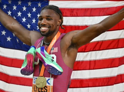 lyles leads us medal charge in tokyo kipyegon eyes fourth title