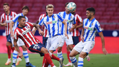 atletico madrid finish third real sociedad granada qualify for europe