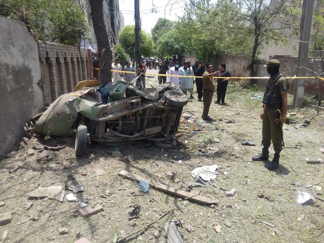 A rickshaw destroyed in the bombing. Photo: EXPRESS