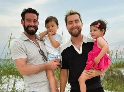 lance bass embraces kenergy shares family summer snaps on beach
