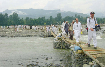 land mafia steps in as waters recede