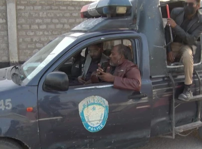 two held for illegal use of loudspeaker