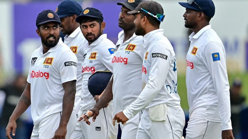 sri lanka s players walk back to the pavilion at the end of the second day of the second test cricket match between sri lanka and new zealand at the galle international cricket stadium in galle on september 27 2024 photo afp