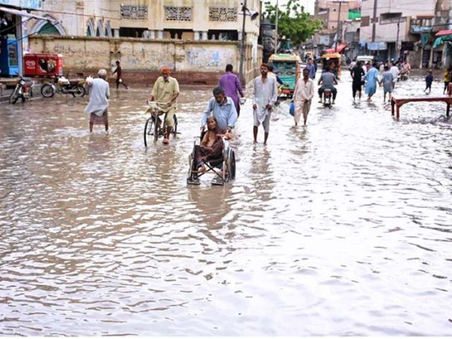 a view of rain water accumulated at empire road in larkana after heavy rains in the city on august 18 2022 photo app