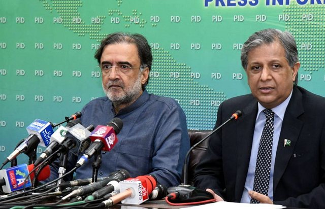 law minister azam nazir tarar addressing a joint press conference with prime minister s adviser qamar zaman kaira photo radio pakistan