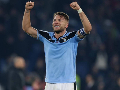 lazio clinch champions league place with win over cagliari
