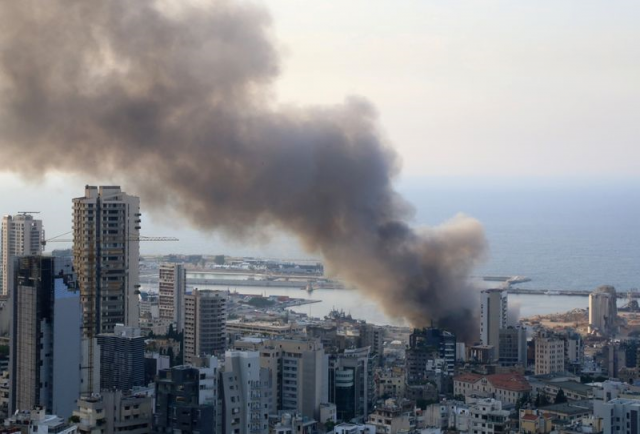 smoke from beirut port remnants of thursday fire no danger to city source smoke from beirut port remnants of thursday fire no danger to city source