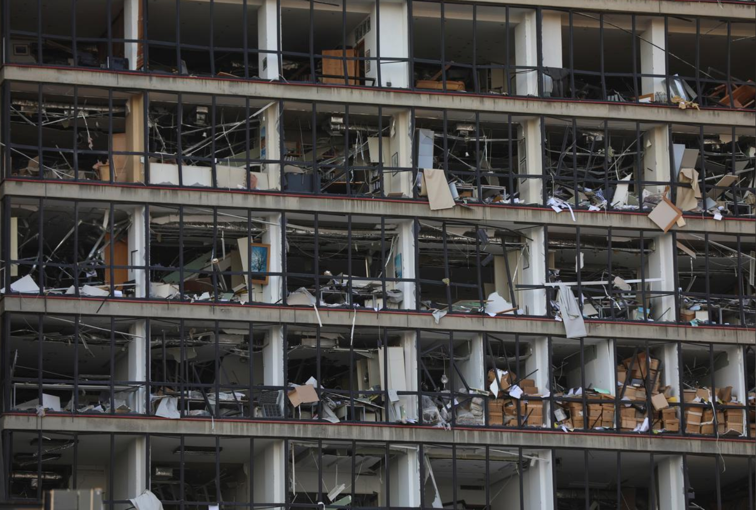 A view shows the damaged facade of a building following Tuesday's blast in Beirut's port area. PHOTO: REUTERS