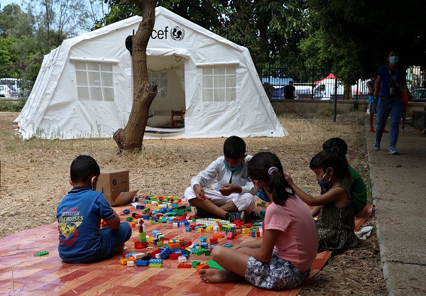 children play outisde a unicef tent put in place to provide psychosocial support to people affected by a massive explosion in beirut s port area lebanon august 20 2020 picture taken august 20 2020 photo reuters