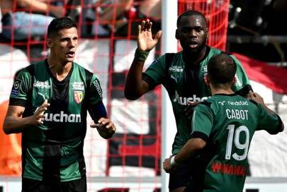 ten man lens grab late equaliser against reims