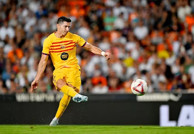 fc barcelona s robert lewandowski scores their second goal from the penalty spot against valencia in laliga opening match played at estadio de mestalla valencia spain on august 17 2024 photo reuters fc barcelona s robert lewandowski scores their second goal from the penalty spot against valencia in laliga opening match played at estadio de mestalla valencia spain on august 17 2024 photo reuters