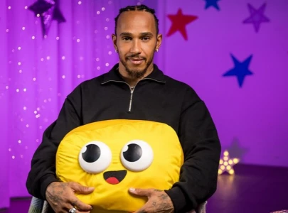 sir lewis hamilton inspires kids on cbeebies bedtime stories