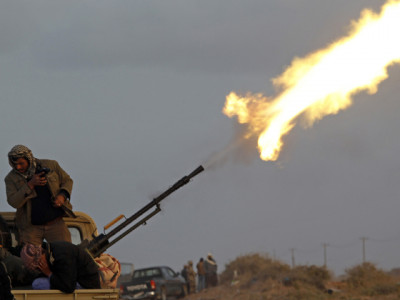 heavy machinegun fire rocks libyan capital tripoli