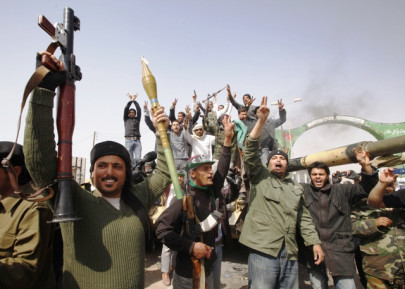 libyan rebels rout qaddafi forces in strategic town libyan rebels rout qaddafi forces in strategic town