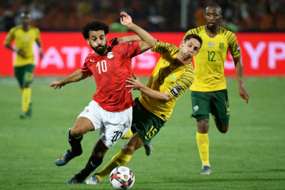 salah helps egypt to crucial triumph in libya