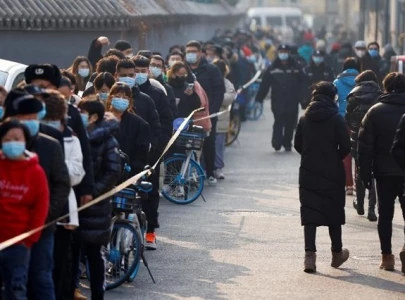 long queues as china s capital launches mass virus tests
