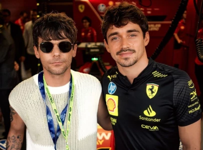 louis tomlinson seen supporting ferrari at monza grand prix