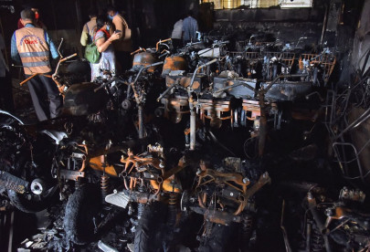 fire at e scooter showroom in india kills eight in deadliest such incident