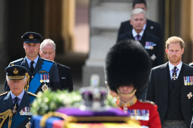 britain s king charles iii prince william and harry walk behind the coffin of queen elizabeth ii photo reuters britain s king charles iii prince william and harry walk behind the coffin of queen elizabeth ii photo reuters