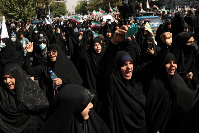 pro government peoples rally against the recent protest gatherings in iran over the case of mahsa amini 22 who died last week after being arrested by the morality police photo reuters pro government peoples rally against the recent protest gatherings in iran over the case of mahsa amini 22 who died last week after being arrested by the morality police photo reuters