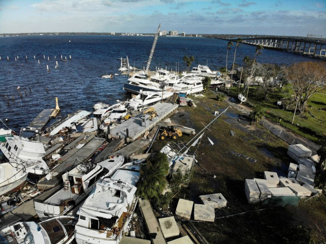 damages are seen downtown after hurricane ian caused widespread destruction in fort myers florida u s september 29 2022 reuters marco bello damages are seen downtown after hurricane ian caused widespread destruction in fort myers florida u s september 29 2022 reuters marco bello