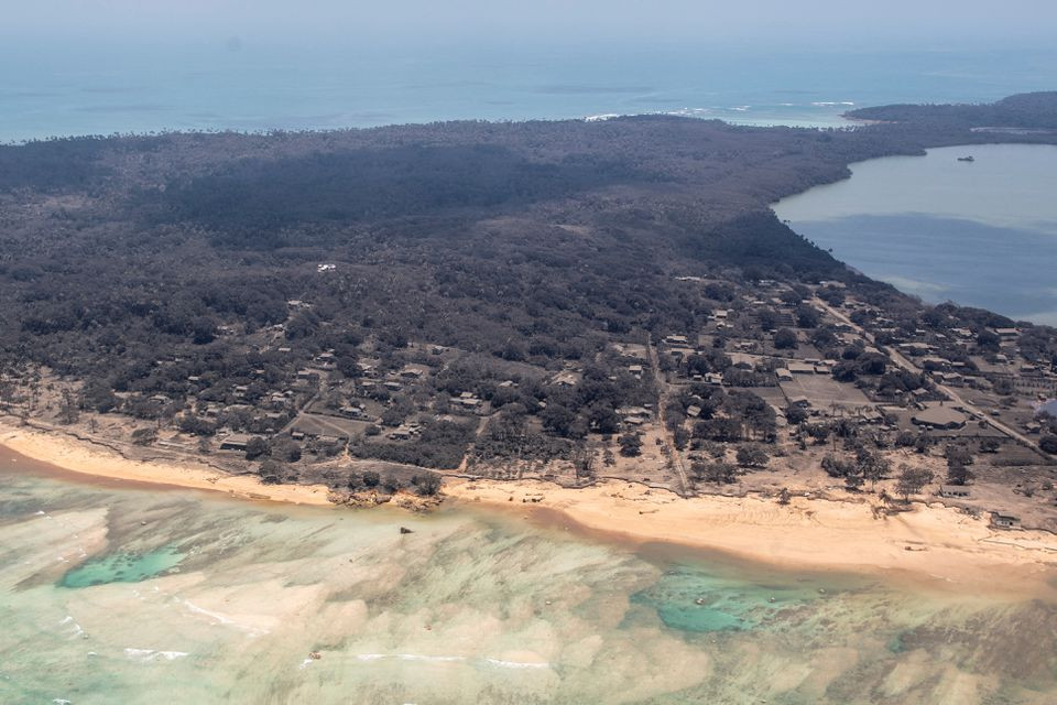 a general view from a new zealand defence force p 3k2 orion surveillance flight shows heavy ash fall over nomuka in tonga after the pacific island nation was hit by a tsunami triggered by an undersea volcanic eruption january 17 2022 new zealand defence force handout via reuters