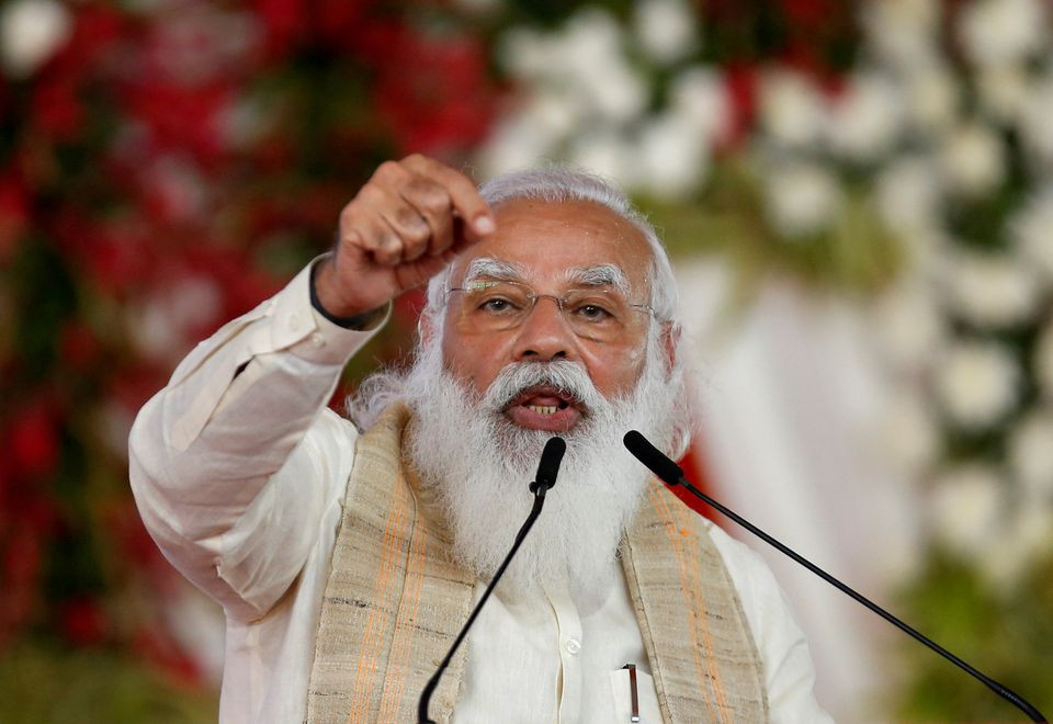 india s prime minister narendra modi addresses a gathering before flagging off the dandi march or salt march to celebrate the 75th anniversary of india s independence in ahmedabad india march 12 2021 reuters