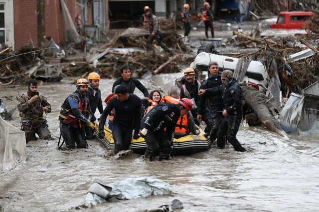 search and rescue team members evacuate locals during flash floods which have swept through towns in the turkish black sea region in bozkurt a town in kastamonu province turkey photo reuters search and rescue team members evacuate locals during flash floods which have swept through towns in the turkish black sea region in bozkurt a town in kastamonu province turkey photo reuters