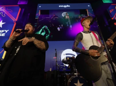 machine gun kelly and jelly roll drop long awaited collaboration lonely road